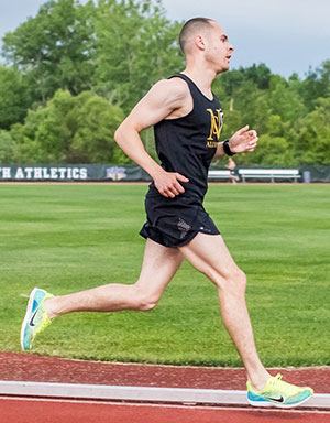 Photo of Chris Patterson running the McMullen Mile in 2015